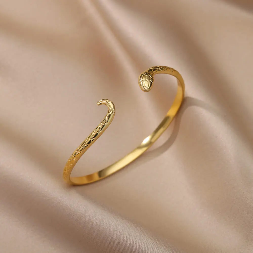 Brazalete para las mujeres de acero inoxidable chapado en oro.