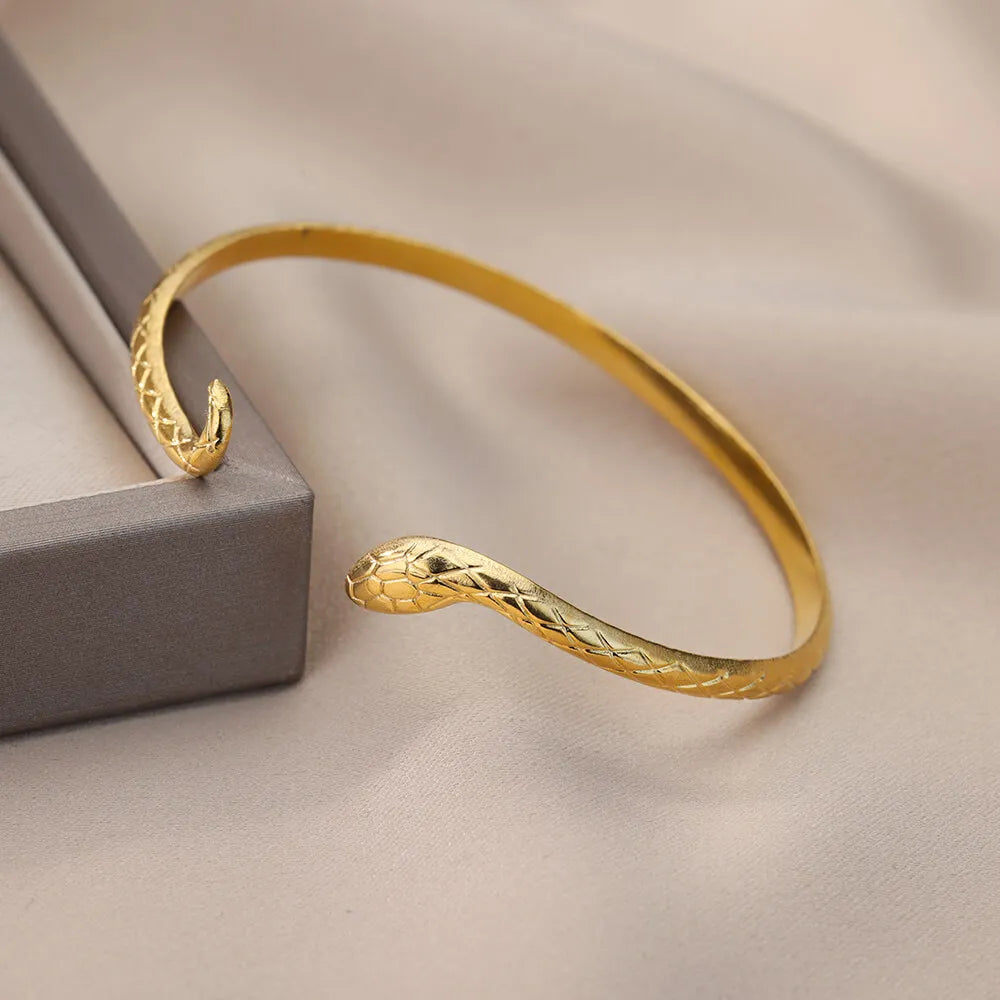 Brazalete para las mujeres de acero inoxidable chapado en oro.