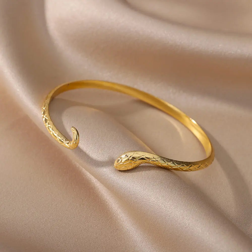 Brazalete para las mujeres de acero inoxidable chapado en oro.